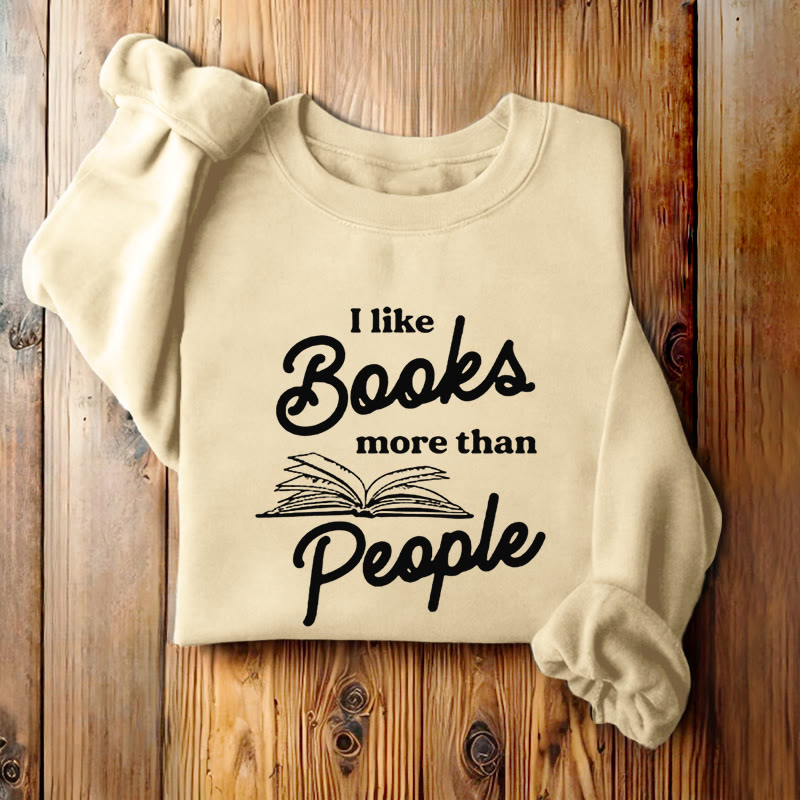 I LIKE BOOKS MORE THAN PEOPLE Womens Crewneck Sweatshirt Pullover