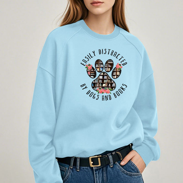 EASILY DISTRACTED BY DOGS AND BOOKS Womens Crewneck Sweatshirt Pullover