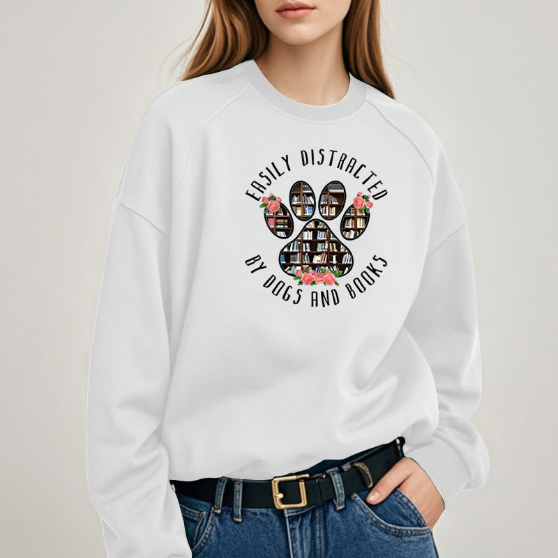 EASILY DISTRACTED BY DOGS AND BOOKS Womens Crewneck Sweatshirt Pullover