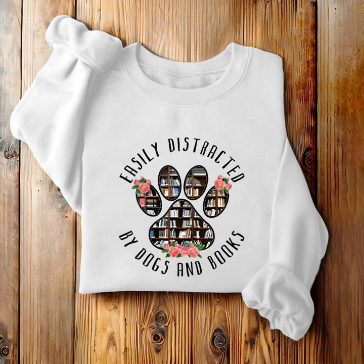 EASILY DISTRACTED BY DOGS AND BOOKS Womens Crewneck Sweatshirt Pullover