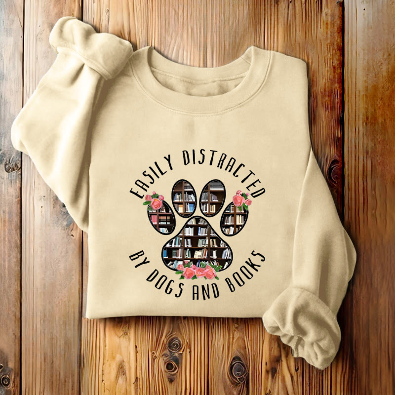 EASILY DISTRACTED BY DOGS AND BOOKS Womens Crewneck Sweatshirt Pullover