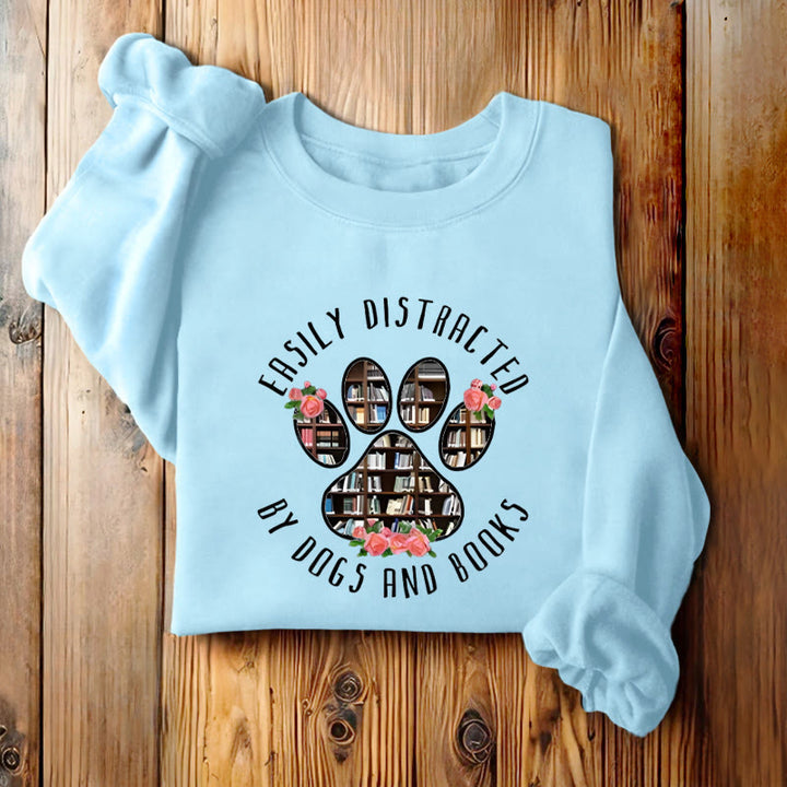 EASILY DISTRACTED BY DOGS AND BOOKS Womens Crewneck Sweatshirt Pullover